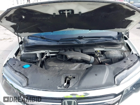 2016 Honda Pilot Elite with VIN 5FNYF6H00GB104329, listed as a IAAI auction lot 41905390 with 125,501 mi miles. Bid and sale history available at carsss.com. Image 10.