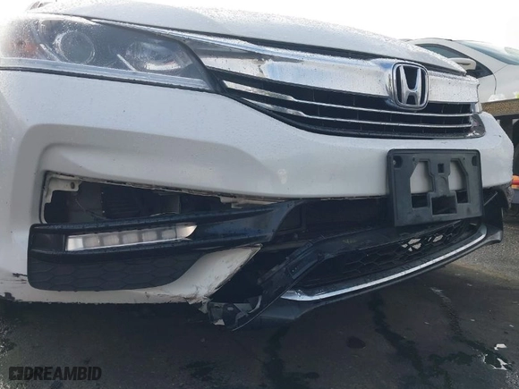 2017 Honda Accord Hybrid EX-L with VIN JHMCR6F50HC031783, listed as a IAAI auction lot 41909790 with NaN miles. Bid and sale history available at carsss.com. Image 6.