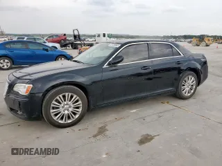 2014 Chrysler 300 z VIN 2C3CCARG4EH232893, wystawiony jako Copart lot #57483065 z przebiegiem 199 604 mil mil oraz Czysty tytuł • Clean title. Historia ofert i sprzedaży dostępna na DreamBid. Obrazek 1.