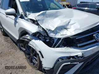 2023 Volkswagen Tiguan SE with VIN 3VVMB7AX4PM128427, listed as a IAAI auction lot 42054477 with 29,731 mi miles and . Bid and sale history available at DreamBid. Image 6.