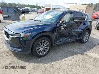 2021 Mazda CX-5 Grand Touring with VIN JM3KFBDM8M0484383, listed as a IAAI auction lot 41800786 with 58,617 mi miles. Bid and sale history available at carsss.com. Image 17.