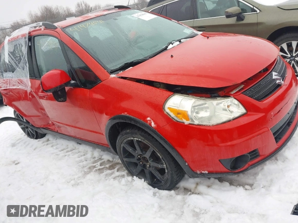 2009 Suzuki SX4 Man Touring Pkg AWD with VIN JS2YB417295101711, listed as a IAAI auction lot 41454641 with 200,540 mi miles. Bid and sale history available at carsss.com. Image 1.