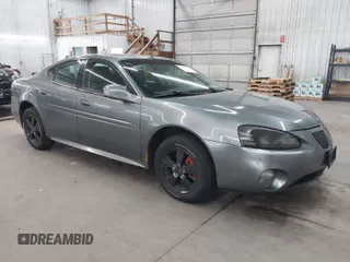 2005 Pontiac Grand Prix z VIN 2G2WP522051198564, wystawiony jako IAAI lot #41998646 z przebiegiem 210 306 mil mil oraz . Historia ofert i sprzedaży dostępna na DreamBid. Obrazek 1.