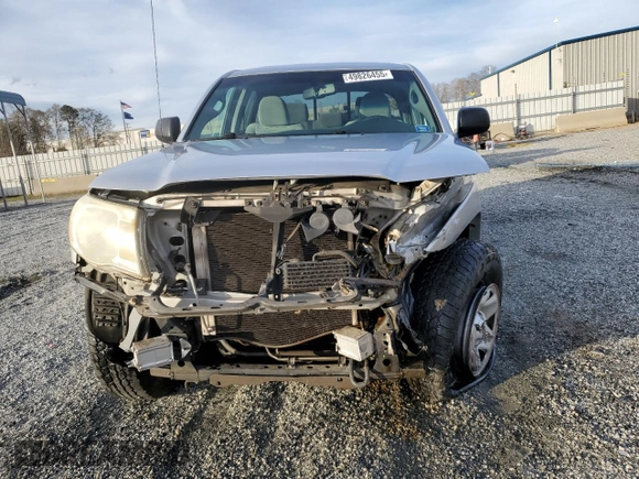2010 Toyota Tacoma PreRunner with VIN 3TMJU4GN6AM102922, listed as a Copart auction lot 49826455 with 302,827 mi miles and Salvage Title. Bid and sale history available at DreamBid. Image 5.