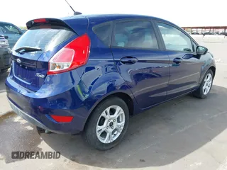 2016 Ford Fiesta SE with VIN 3FADP4EJ4GM199945, listed as a IAAI auction lot 41881260 with 98,945 mi miles. Bid and sale history available at carsss.com. Image 4.