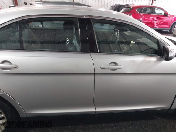 2014 Ford Taurus Limited with VIN 1FAHP2F81EG101351, listed as a IAAI auction lot 41662308 with 139,542 mi miles. Bid and sale history available at carsss.com. Image 13.