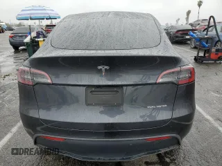 2025 Tesla Model Y Long Range with VIN 7SAYGAEE3SF216635, listed as a Copart auction lot 44614555 with 400 mi miles and Salvage Title. Bid and sale history available at DreamBid. Image 6.