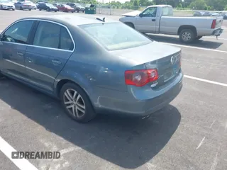 2006 Volkswagen Jetta 1.9L TDI z VIN 3VWST71K66M834544, wystawiony jako IAAI lot #42557527 z przebiegiem Nie podano mil oraz . Historia ofert i sprzedaży dostępna na DreamBid. Obrazek 3.