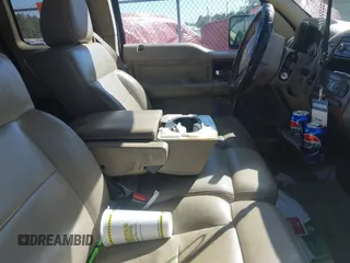 2005 Ford F-150 XLT with VIN 1FTPX12575NA61851, listed as a IAAI auction lot 41713974 with 251,639 mi miles. Bid and sale history available at carsss.com. Image 5.