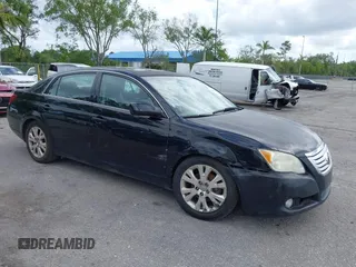 2010 Toyota Avalon XL with VIN 4T1BK3DB1AU353725, listed as a IAAI auction lot 41984608 with 153,759 mi miles and . Bid and sale history available at carsss.com. Image 1.