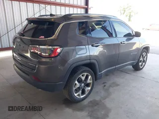 2021 Jeep Compass Limited with VIN 3C4NJDCB4MT565268, listed as a IAAI auction lot 41989761 with 97,368 mi miles and . Bid and sale history available at DreamBid. Image 4.