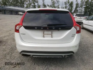 2018 Volvo V60 z VIN YV440MWK1J2051771, wystawiony jako Copart lot #67960674 z przebiegiem 49 782 mil mil oraz Szkoda całkowita • Salvage title. Historia ofert i sprzedaży dostępna na DreamBid. Obrazek 6.