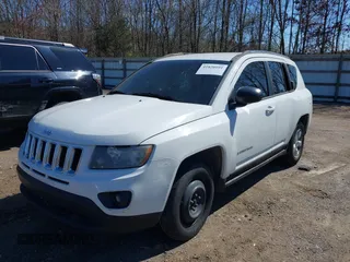 2014 Jeep Compass Altitude with VIN 1C4NJCBAXED594798, listed as a IAAI auction lot 41820101 with 234,533 mi miles. Bid and sale history available at carsss.com. Image 2.