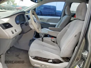 2014 Toyota Sienna LE AAS with VIN 5TDKK3DC4ES486440, listed as a Copart auction lot 62010355 with 401,453 mi miles and Salvage title. Bid and sale history available at DreamBid. Image 7.