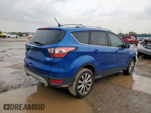 2018 Ford Escape Titanium with VIN 1FMCU9J98JUB31234, listed as a Copart auction lot 58817705 with 140,183 mi miles and Salvage title. Bid and sale history available at DreamBid. Image 3.
