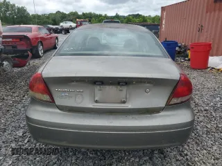 2004 Ford Taurus SE with VIN 1FAFP53274A193186, listed as a Copart auction lot 60255125 with 184,493 mi miles and Salvage title. Bid and sale history available at DreamBid. Image 6.