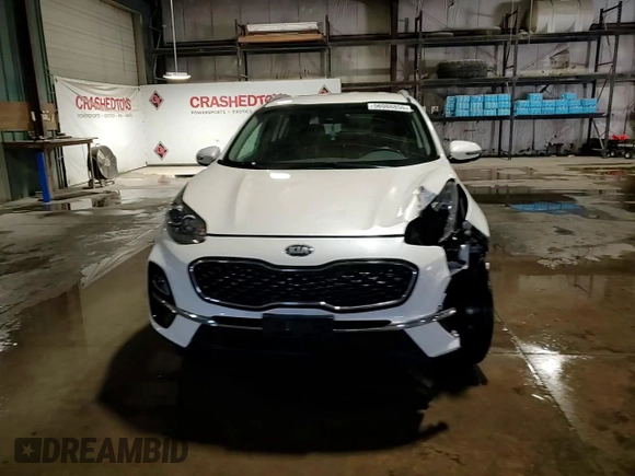 2020 Kia Sportage EX z VIN KNDPNCAC6L7804485, wystawiony jako Copart lot #56988855 z przebiegiem 117 112 mil mil oraz Szkoda całkowita • Salvage title. Historia ofert i sprzedaży dostępna na DreamBid. Obrazek 14.