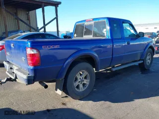 2004 Ford Ranger XL Fleet with VIN 1FTZR45E24PB31422, listed as a IAAI auction lot 41436032 with 124,642 mi miles. Bid and sale history available at carsss.com. Image 4.
