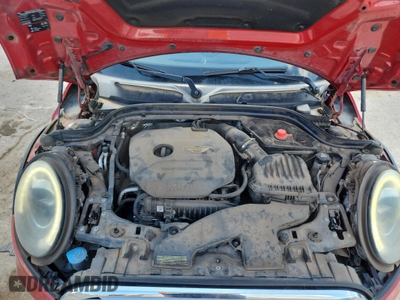 2015 MINI Hardtop with VIN WMWXM5C59FT939742, listed as a Copart auction lot 63778555 with 110,428 mi miles and Salvage title. Bid and sale history available at DreamBid. Image 11.