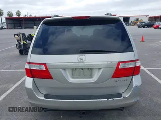 2005 Honda Odyssey EX-L with VIN 5FNRL38745B075486, listed as a IAAI auction lot 42080772 with 197,158 mi miles and . Bid and sale history available at DreamBid. Image 16.