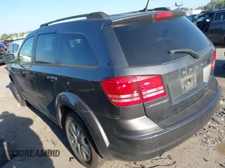 2017 Dodge Journey SE z VIN 3C4PDCAB9HT551840, wystawiony jako IAAI lot #41977338 z przebiegiem 202 856 mil mil oraz . Historia ofert i sprzedaży dostępna na DreamBid. Obrazek 3.