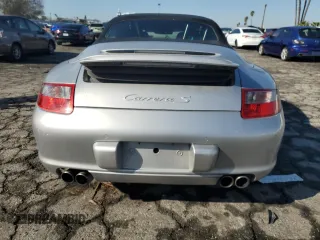 2005 Porsche 911 Carrera S z VIN WP0CB29995S765398, wystawiony jako Copart lot #42413555 z przebiegiem 32 993 mil mil oraz Szkoda całkowita • Salvage title. Historia ofert i sprzedaży dostępna na DreamBid. Obrazek 6.