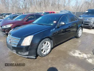 2009 Cadillac CTS AWD z VIN 1G6DH577290166448, wystawiony jako IAAI lot #41751610 z przebiegiem 158 378 mil mil oraz . Historia ofert i sprzedaży dostępna na DreamBid. Obrazek 17.