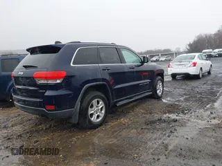 2014 Jeep Grand Cherokee Laredo with VIN 1C4RJFAGXEC109865, listed as a IAAI auction lot 41971070 with 129,460 mi miles. Bid and sale history available at carsss.com. Image 4.