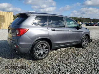 2019 Honda Passport EX-L with VIN 5FNYF7H5XKB001901, listed as a Copart auction lot 87186504 with 93,540 mi miles and Salvage Title. Bid and sale history available at carsss.com. Image 3.