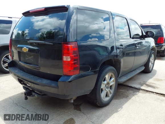 2013 Chevrolet Tahoe Commercial with VIN 1GNLC2E09DR286027, listed as a IAAI auction lot 42229760 with 203,474 mi miles and . Bid and sale history available at DreamBid. Image 4.