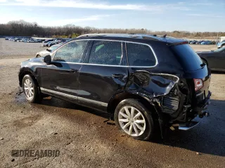 2016 Volkswagen Touareg Sport z VIN WVGEP9BP3GD004865, wystawiony jako Copart lot #87610915 z przebiegiem Nie podano mil oraz Szkoda całkowita • Salvage title. Historia ofert i sprzedaży dostępna na DreamBid. Obrazek 2.