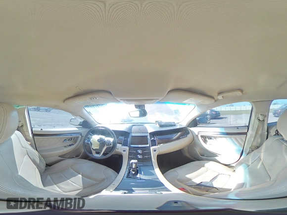 2014 Ford Taurus Limited z VIN 1FAHP2F82EG141034, wystawiony jako Copart lot #52579995 z przebiegiem 207 709 mil mil oraz Szkoda całkowita • Salvage title. Historia ofert i sprzedaży dostępna na DreamBid. Obrazek 12.
