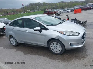 2017 Ford Fiesta S z VIN 3FADP4AJ1HM104006, wystawiony jako IAAI lot #41943413 z przebiegiem 111 873 mil mil oraz . Historia ofert i sprzedaży dostępna na DreamBid. Obrazek 13.