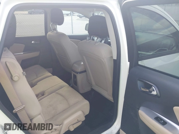 2015 Dodge Journey SXT with VIN 3C4PDCBG0FT653857, listed as a IAAI auction lot 42128410 with 182,960 mi miles and . Bid and sale history available at DreamBid. Image 8.