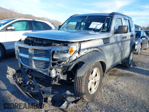 2007 Dodge Nitro SXT with VIN 1D8GU28K67W740794, listed as a IAAI auction lot 41591855 with 162,709 mi miles. Bid and sale history available at carsss.com. Image 6.