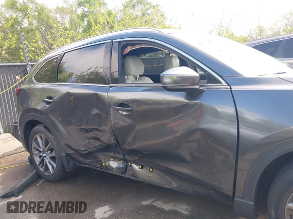 2020 Mazda CX-9 Signature with VIN JM3TCBEYXL0402053, listed as a IAAI auction lot 42070846 with 47,695 mi miles and . Bid and sale history available at DreamBid. Image 6.