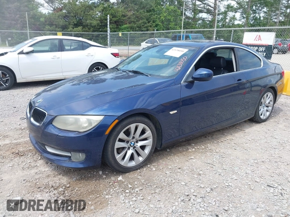 2011 BMW 3 Series 328i with VIN WBAKE3C52BE557501, listed as a IAAI auction lot 42138050 with 209,575 mi miles and . Bid and sale history available at carsss.com. Image 2.