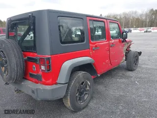 2010 Jeep Wrangler Unlimited Sport with VIN 1J4BA3H14AL217520, listed as a IAAI auction lot 41380169 with 153,672 mi miles. Bid and sale history available at carsss.com. Image 4.