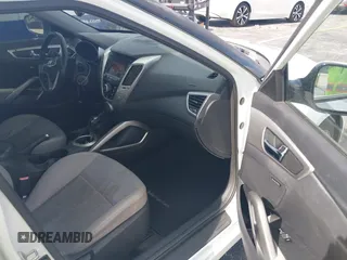 2013 Hyundai Veloster w/Gray Int with VIN KMHTC6AD0DU150516, listed as a IAAI auction lot 42164880 with 122,841 mi miles and . Bid and sale history available at DreamBid. Image 5.