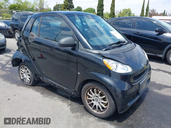 2012 Smart fortwo Pure z VIN WMEEJ3BA1CK556029, wystawiony jako IAAI lot #42173735 z przebiegiem 85 133 mil mil oraz . Historia ofert i sprzedaży dostępna na DreamBid. Obrazek 1.