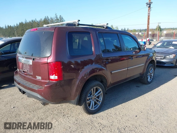 2014 Honda Pilot Touring with VIN 5FNYF4H93EB502117, listed as a IAAI auction lot 42086774 with 111,003 mi miles and . Bid and sale history available at carsss.com. Image 4.