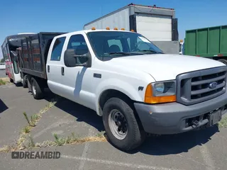 1999 Ford F-350 with VIN 1FDSW34S6XEE06653, listed as a IAAI auction lot 42697070 with 194,164 mi miles and . Bid and sale history available at DreamBid. Image 1.
