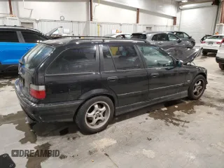 1997 BMW M3 with VIN WBACE11020EZ24250, listed as a Copart auction lot 85107784 with 147,369 mi miles and Clean title. Bid and sale history available at DreamBid. Image 3.