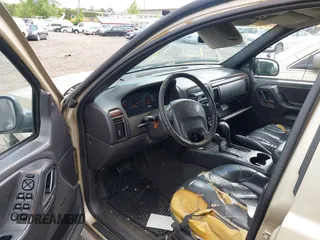2000 Jeep Grand Cherokee Laredo with VIN 1J4GW48S3YC347711, listed as a IAAI auction lot 42305308 with Not provided miles and . Bid and sale history available at DreamBid. Image 5.