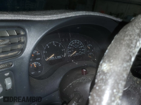 2001 GMC Sonoma SLS 1SG z VIN 1GTCS19W818228836, wystawiony jako Copart lot #85732914 z przebiegiem Nie podano mil oraz Tytuł czysty. Historia ofert i sprzedaży dostępna na DreamBid. Obrazek 9.