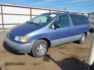 2000 Toyota Sienna LE with VIN 4T3ZF13C2YU183815, listed as a IAAI auction lot 42462319 with 217,175 mi miles and . Bid and sale history available at DreamBid. Image 2.