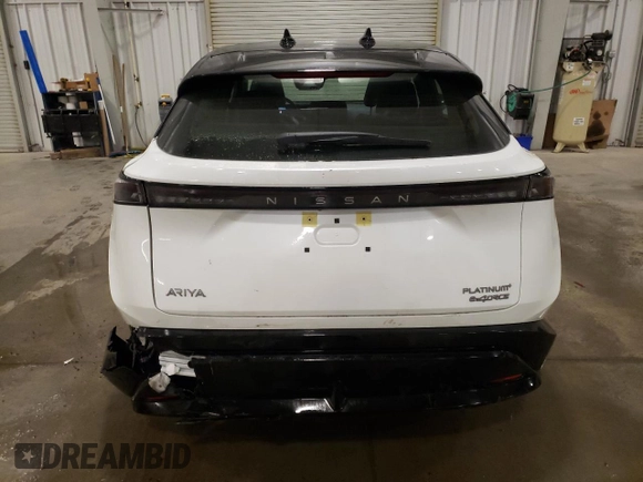 2023 Nissan ARIYA Platinum+ z VIN JN1DF0CD9PM701320, wystawiony jako Copart lot #86995114 z przebiegiem 12 770 mil mil oraz Szkoda całkowita • Salvage title. Historia ofert i sprzedaży dostępna na DreamBid. Obrazek 6.