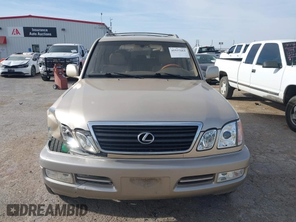 2000 Lexus LX 470 with VIN JT6HT00W0Y0098917, listed as a IAAI auction lot 41937661 with 180,980 mi miles and . Bid and sale history available at DreamBid. Image 12.