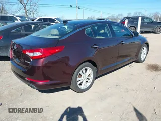 2012 Kia Optima EX with VIN 5XXGN4A6XCG041961, listed as a IAAI auction lot 41705409 with 171,216 mi miles and . Bid and sale history available at carsss.com. Image 4.