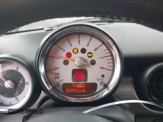 2013 MINI Convertible S with VIN WMWZP3C54DT297304, listed as a IAAI auction lot 41377572 with 101,991 mi miles and . Bid and sale history available at DreamBid. Image 7.